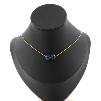 Collier 2 perles Oeil de Tigre bleu clair 8 mm. Chaine en acier doré inoxydable