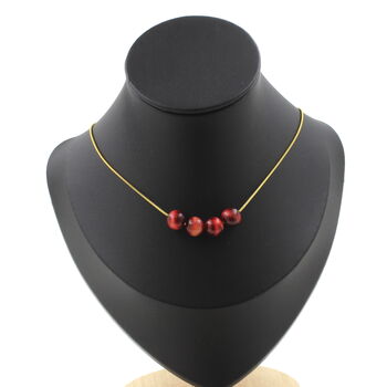Two-tone peach Tiger's Eye 8 mm 4 beads necklace. Golden stainless steel chain