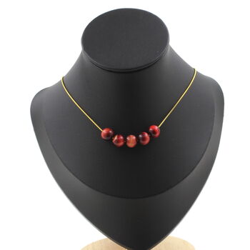 Two-tone peach Tiger's Eye 8 mm 5 beads necklace. Golden Stainless steel chain