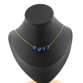 Light blue Tiger's Eye 8 mm 4 beads necklace. Golden stainless steel chain