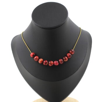 Collier 10 perles Oeil de Tigre pêche bicolore 8 mm. Chaine en acier doré inoxydable