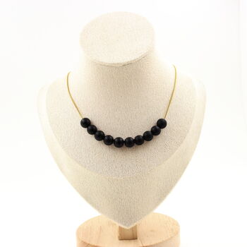 Matte black Onyx 8 mm 10 beads necklace. Golden stainless steel chain