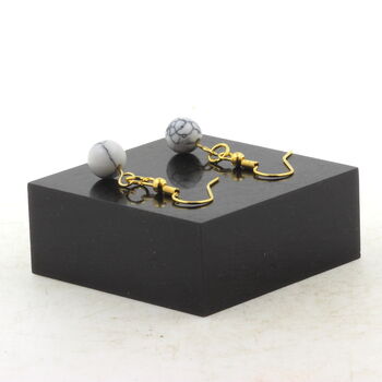 Golden Stainless steel Earrings Howlite 8 mm 1 Bead.