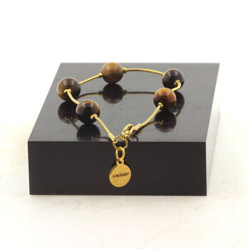 Bracelet en acier doré inoxydable 5 Perles Oeil de Tigre 8 mm.