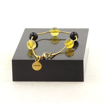 Bracelet en acier doré inoxydable 5 Perles Citrine + Agate noire 8 mm.