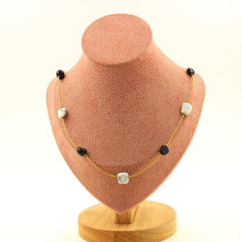 Schorl Tourmaline from Brazil + Howlite from the USA 9 beads necklace. Golden Stainless steel chain