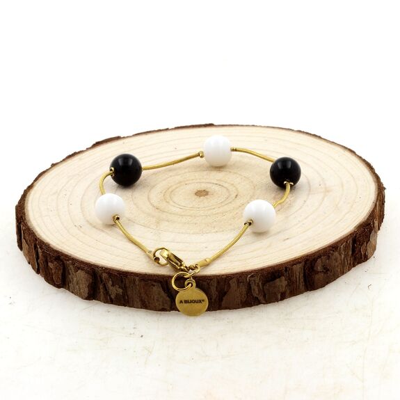 Bracelet en acier doré inoxydable 5 Perles Agate blanche + Agate noire 8 mm.
