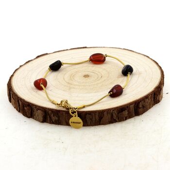 Bracelet en acier doré inoxydable 5 Perles Agate rouge + Obsidienne noire.