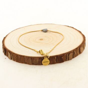 Bracelet en acier doré inoxydable 1 Perle Hématite forme coeur 5 mm.