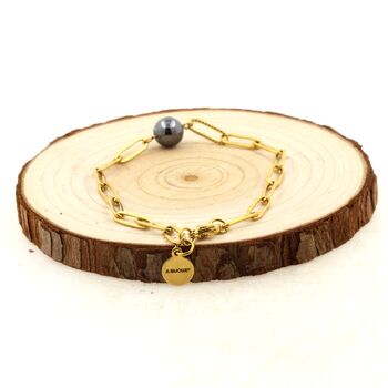 Bracelet en acier doré inoxydable double chaine (3x11mm) 1 Perle Hématite 8 mm.