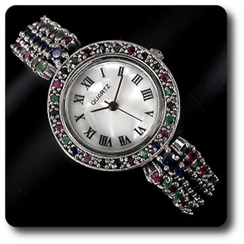 MONTRE RUBIS SAPHIR EMERAUDE