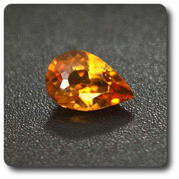 0.27 cts CLINOHUMITE ORANGE. IF