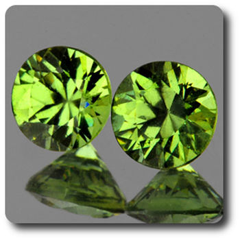 0.77 cts LOT DE 2 GRENAT DEMANTOIDE . IF