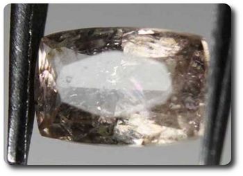 0.36CT. COLOR CHANGE AXINITE-(Mg) . VS