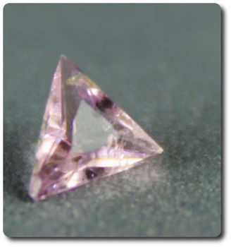 0.04 cts PEZZOTAITE . VS