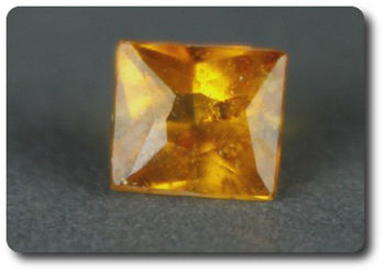 0.17CT. ORANGE CLINOHUMITE. VS