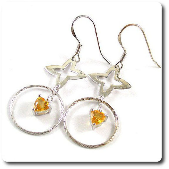 Boucles d'oreilles citrines. Un bijou sur or jaune aux couleurs du soleil - Compagnie des Gemmes Boucles d'oreilles citrines. Un bijou sur or jaune aux couleurs du soleil - Compagnie des Gemmes