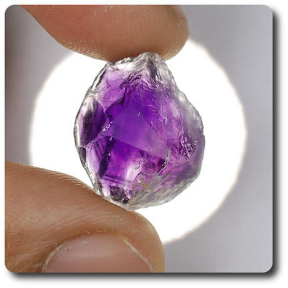 12.12  carats CRISTAL D' AMETHYSTE