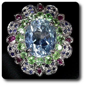 TOPAZ, TSAVORITE GARNET, SAPPHIRE & RUBY RING