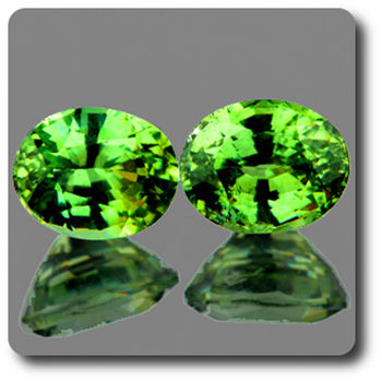 0.77 cts LOT DE 2 GRENAT DEMANTOIDE . IF