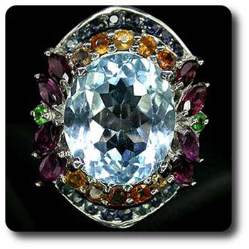 TOPAZ, SAPPHIRE & TSAVORITE GARNET RING