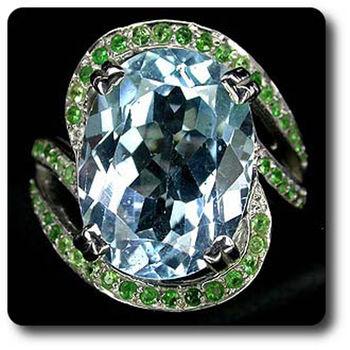 BLUE TOPAZ & TSAVORITE GARNET RING