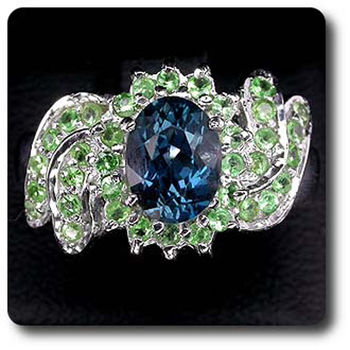 BAGUE TOPAZE BLEU & GRENAT TSAVORITE