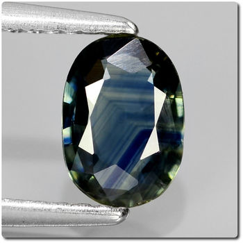 0.81 cts SAPHIR BLEU VERT . SI1