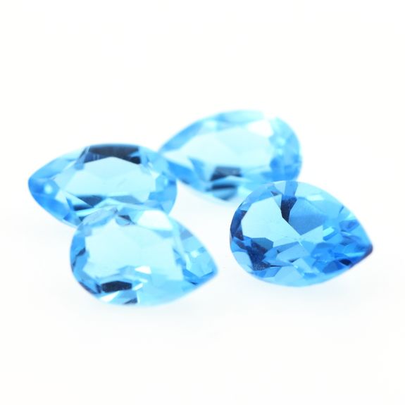 0.49 cts TOPAZE BLEU SWISS . 6x4 MM. IF - VVS1 ( vendu à l'unité )