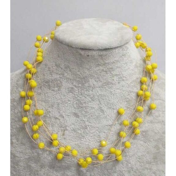 multi-strand pearl jewelry in yellow