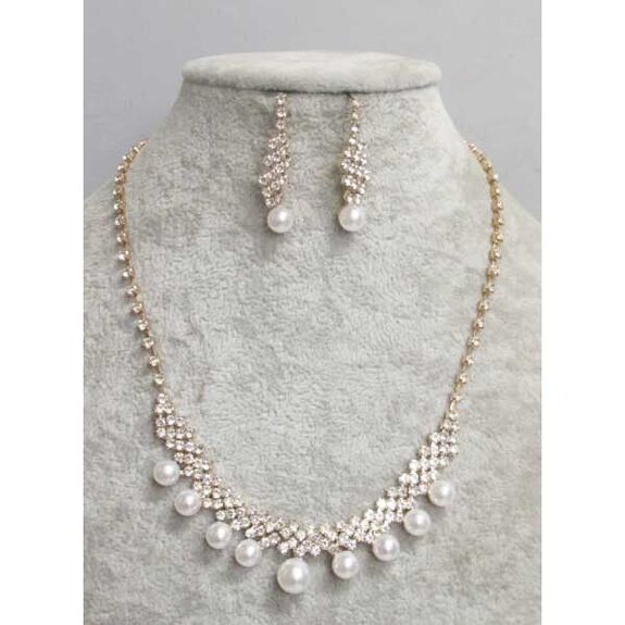 bijoux rangée perle sur strass en doré