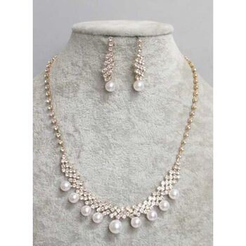 bijoux rangée perle sur strass en doré
