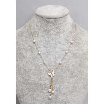 pendentif acier papillon nacre et boules perles tombantes