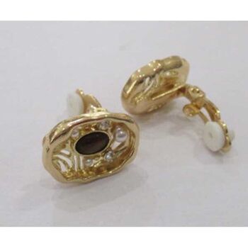 Gold-tone clip-on earring with pearl