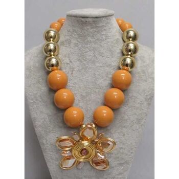 yellow ball jewelry with aluminum flower