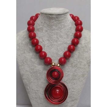 Resin necklace with red spiral beads