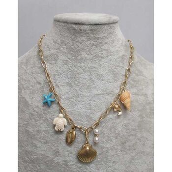 Steel jewelry with sun and sea theme