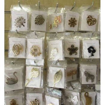 bijoux acier broches vendu en lot