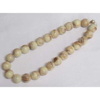 Beige faceted ball jewelry