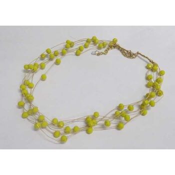 multi-strand pearl jewelry in yellow
