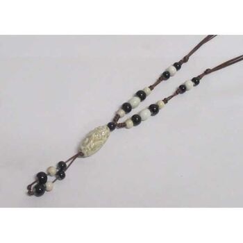 pendentif médaillon noyau bijoux collier