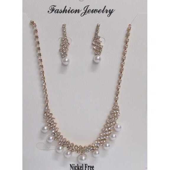 bijoux rangée perle sur strass en doré