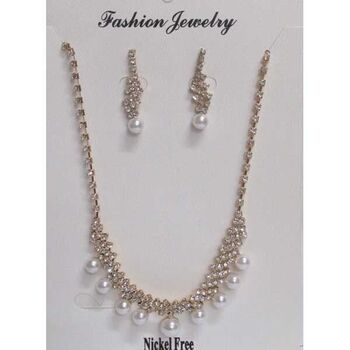 bijoux rangée perle sur strass en doré