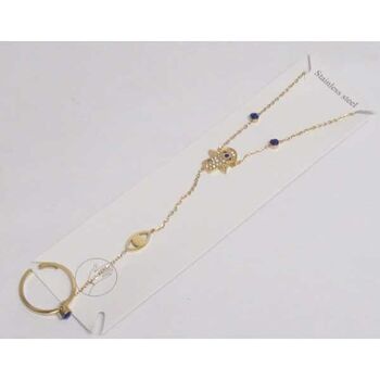 Hand bracelet connected to the finger in gold-plated steel