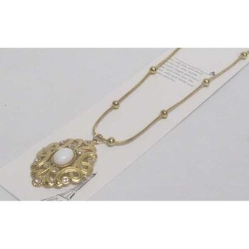 medaillon cristal pierre acier dore