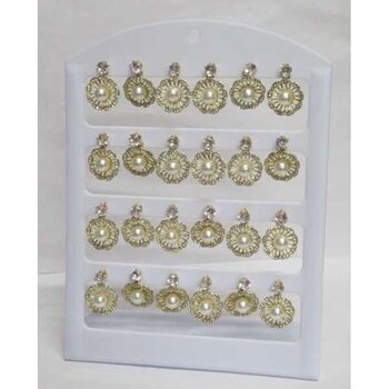 boucles d'oreilles boule perle dans fleur