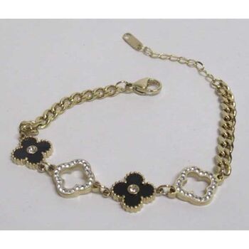 jewelry bracelet with a row of rhinestones and a black enamel clover in gold-plated steel