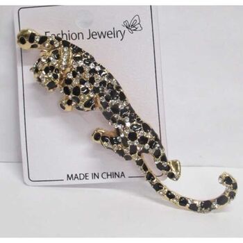 Gold cheetah brooch jewelry on the hunt