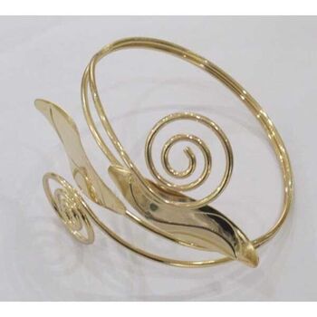 Spiral and leaf-shaped jeweled arms on both sides