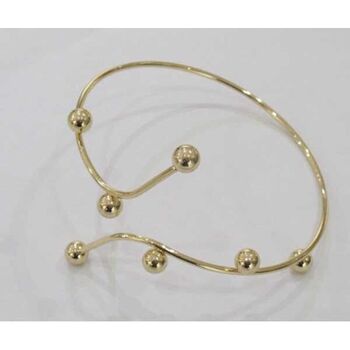 Gold beaded arm jewelry